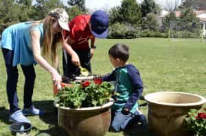 children planting flowers