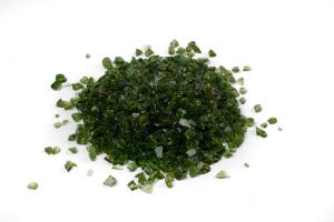 crushed green glass on a white background