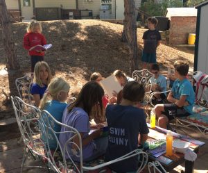 students having class in schoolyard habitat